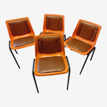 Chairs orange plastic shells seats and backrests imitation leather