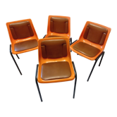 Chairs orange plastic shells seats and backrests imitation leather