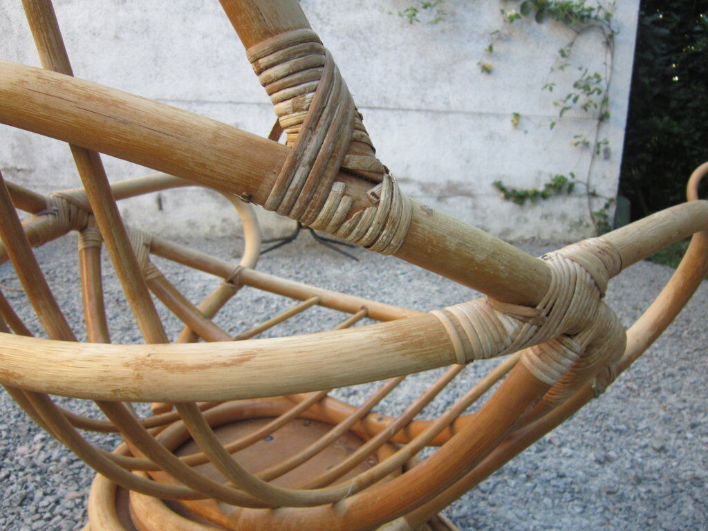 Pair of egg rattan armchairs