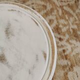 Tripod stool with patinated plant holder