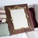 Old wooden and stucco mirror