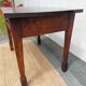 brutalist wooden table