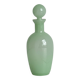 Opaque light green glass vial