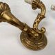 Pair of gilded wooden wall lights with two arms, early 20th century.