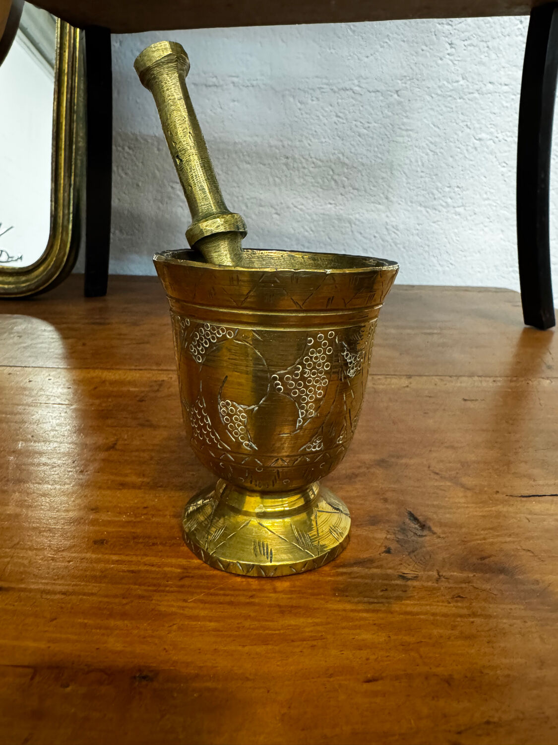 Golden brass mortar and pestle