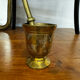 Golden brass mortar and pestle