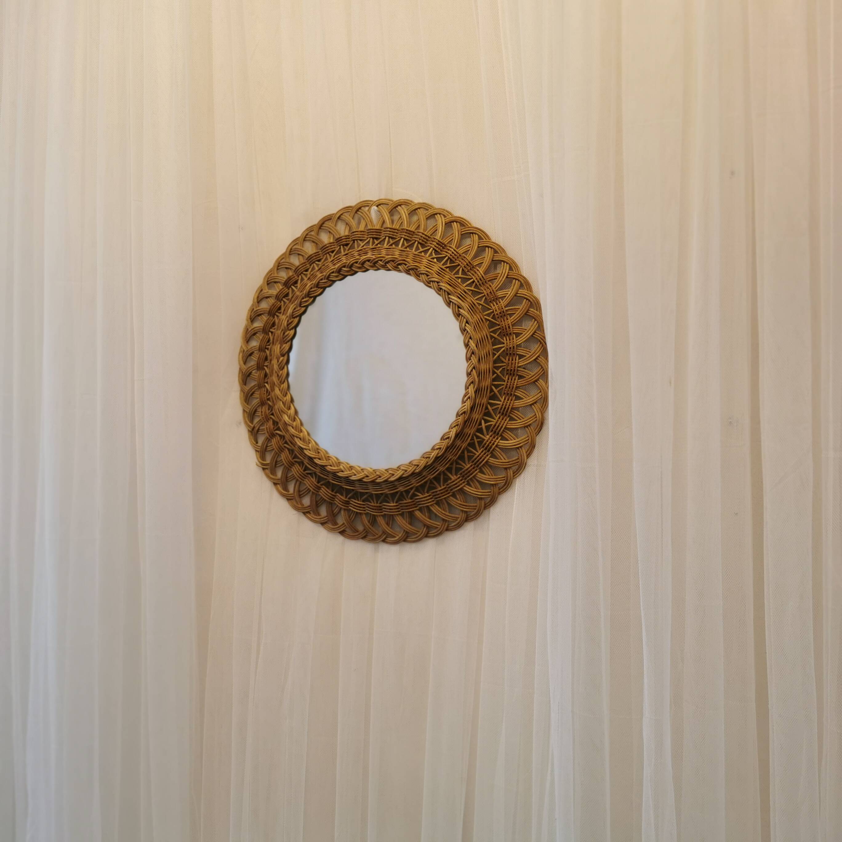 Rattan wall mirror