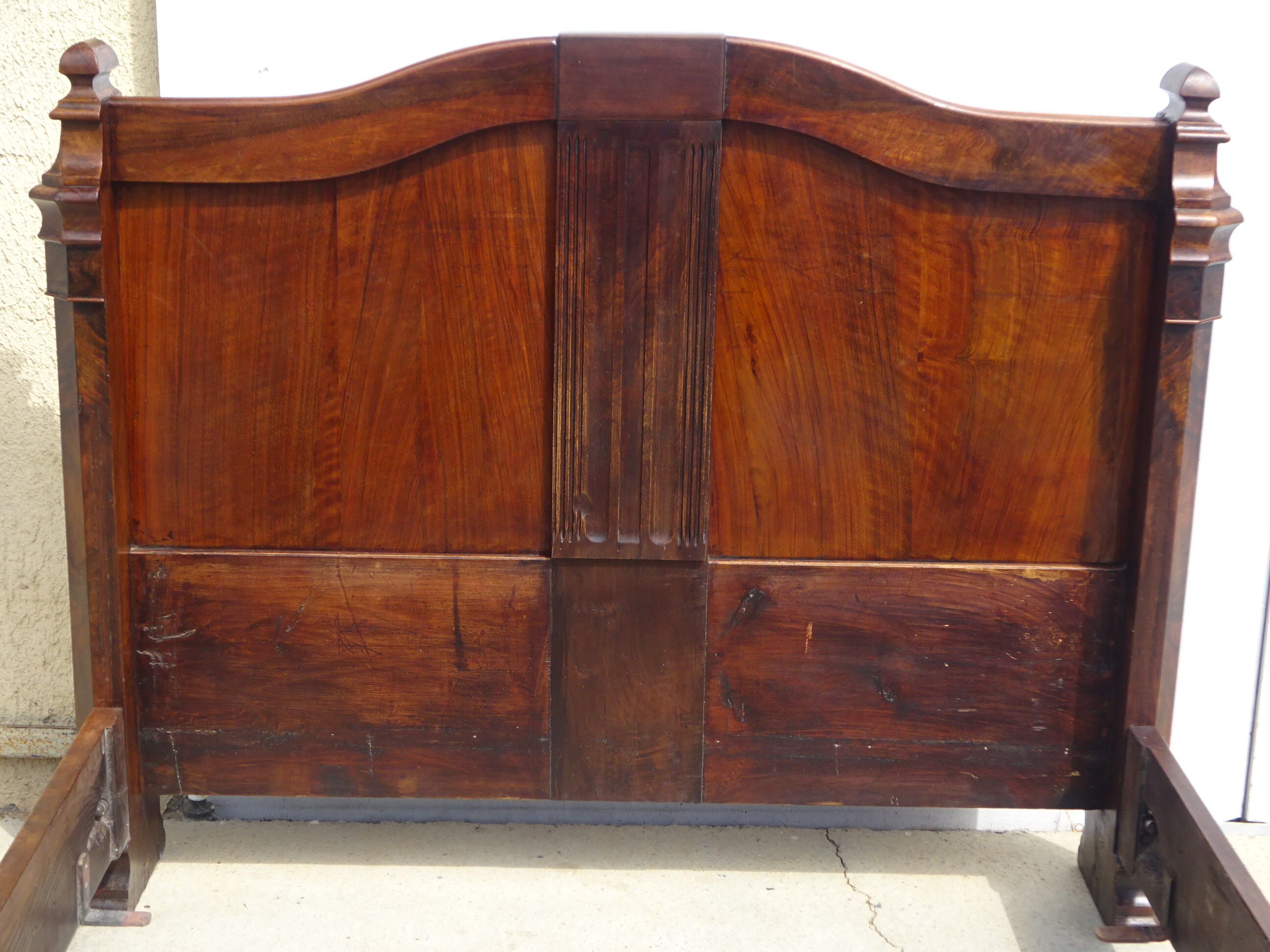 Walnut bed and walnut magnifying glass nineteenth century