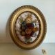 Old frame curved glass dried flowers glossy fabric