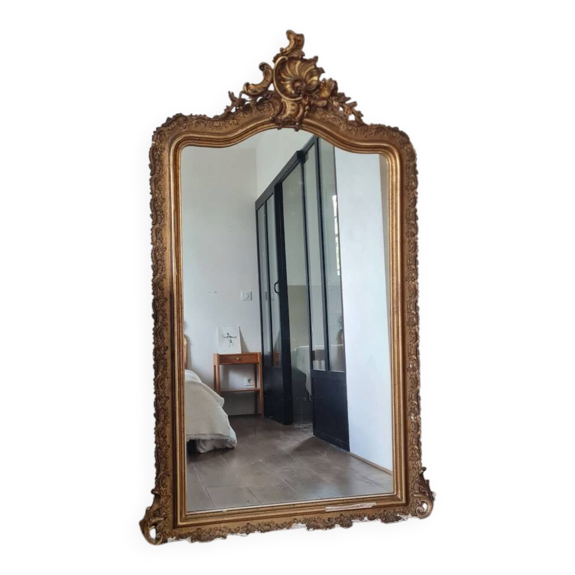 Antique Louis Philippe mirror with a pediment.