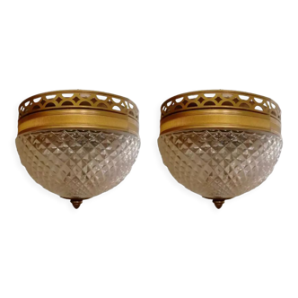 Pair of faceted glass ceiling lights and brass strapping, 1950.