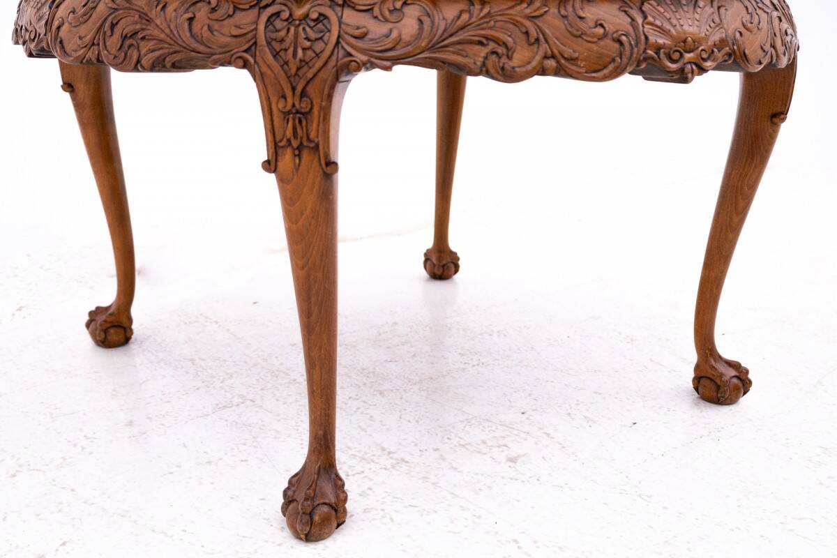 Antique, carved table, Western Europe, around 1910.