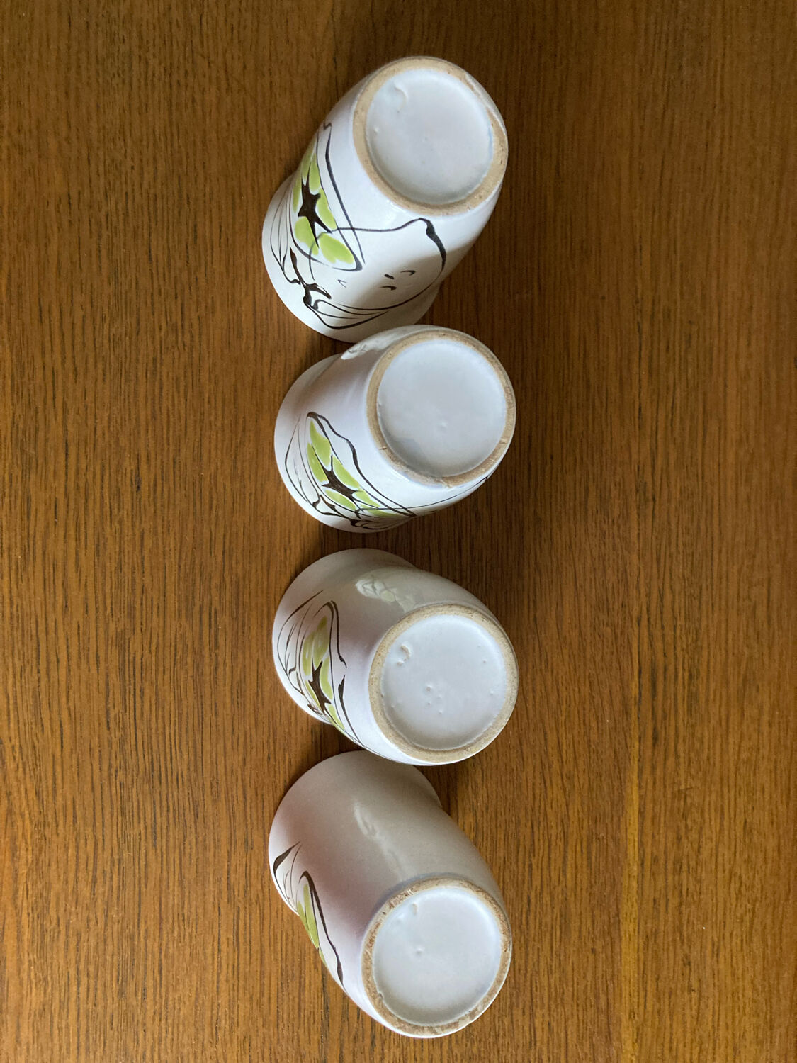 Set of four enameled stoneware glasses