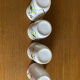Set of four enameled stoneware glasses
