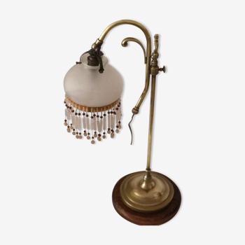 Old lamp adjustable on foot tulip golden brass.