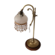 Old lamp adjustable on foot tulip golden brass.