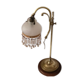 Old lamp adjustable on foot tulip golden brass.