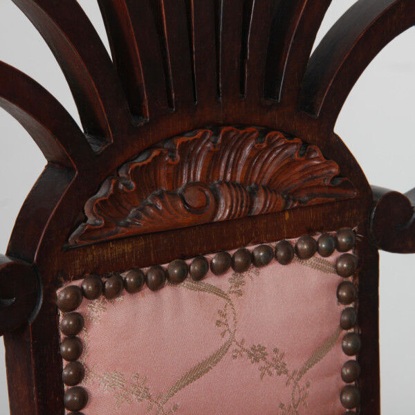 English armchair attributed to J.S. Henry, late 19th century.