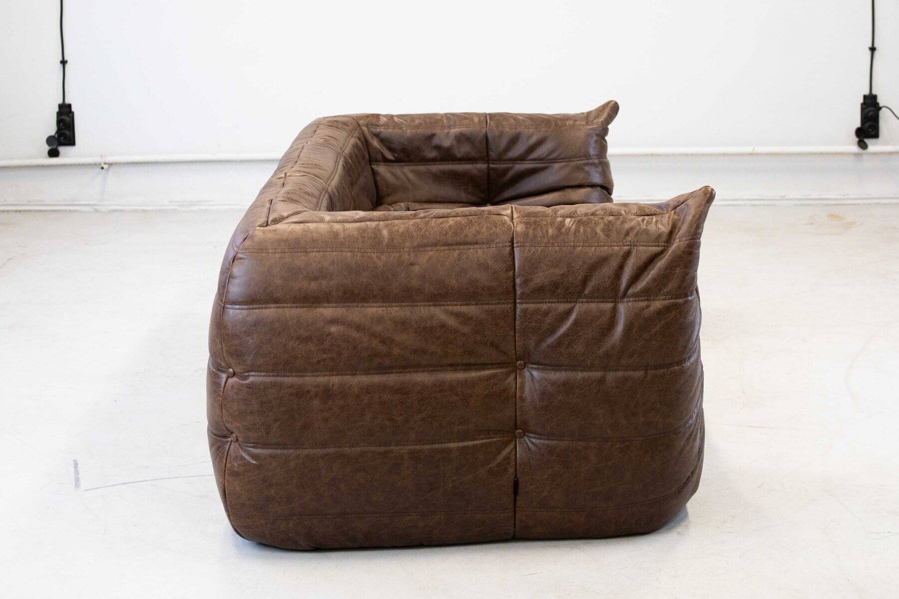 Vintage two-seater Togo sofa with arms in brown leather by Michel Ducaroy for Ligne Roset, 1970s
