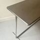 Dining table / tubular and modernist desk in chrome metal