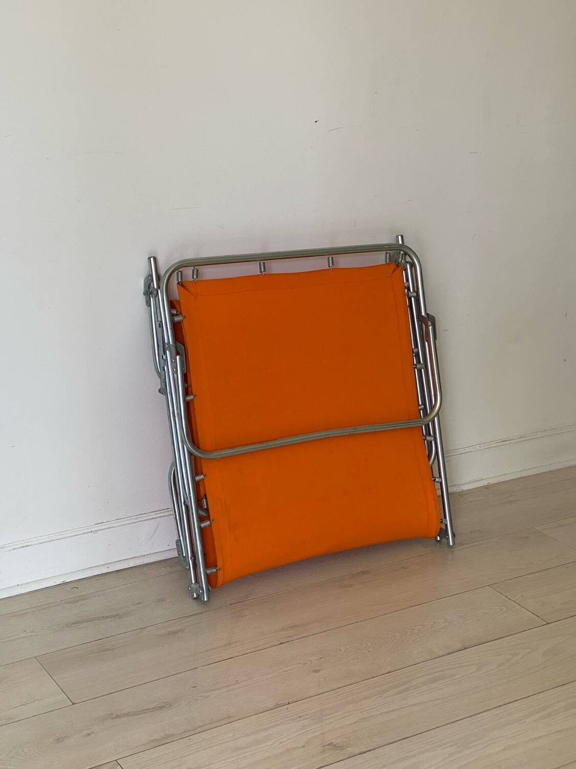 Orange and metal deckchair 1970
