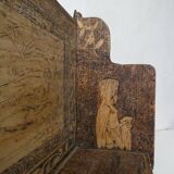 carved wooden shelf