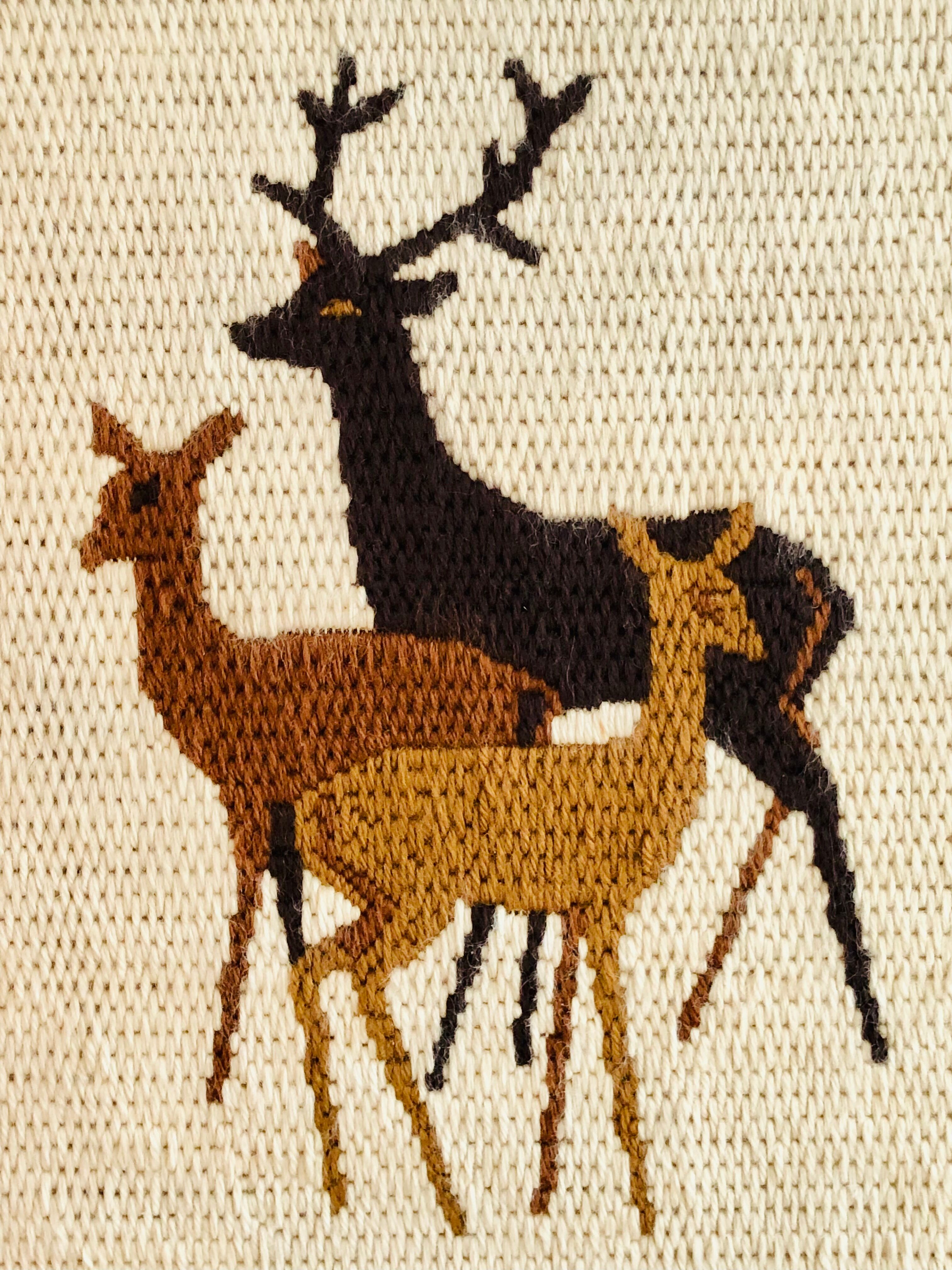 Vintage wool weaving deer family