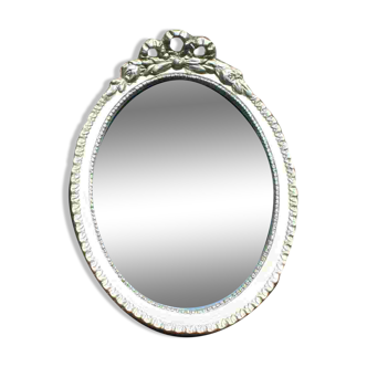 Oval mirror with golden knot