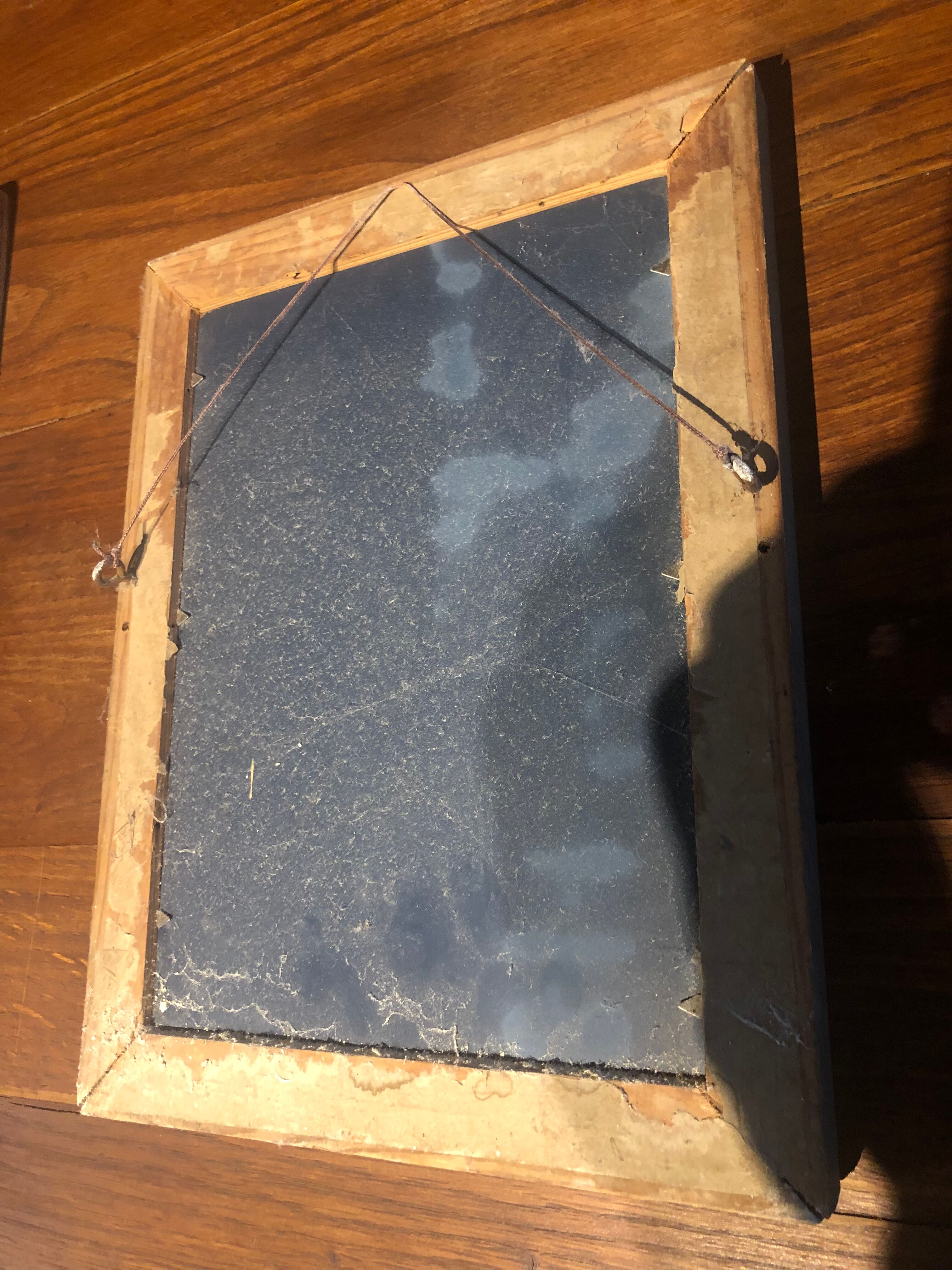 Small carved mirror 22x32cm