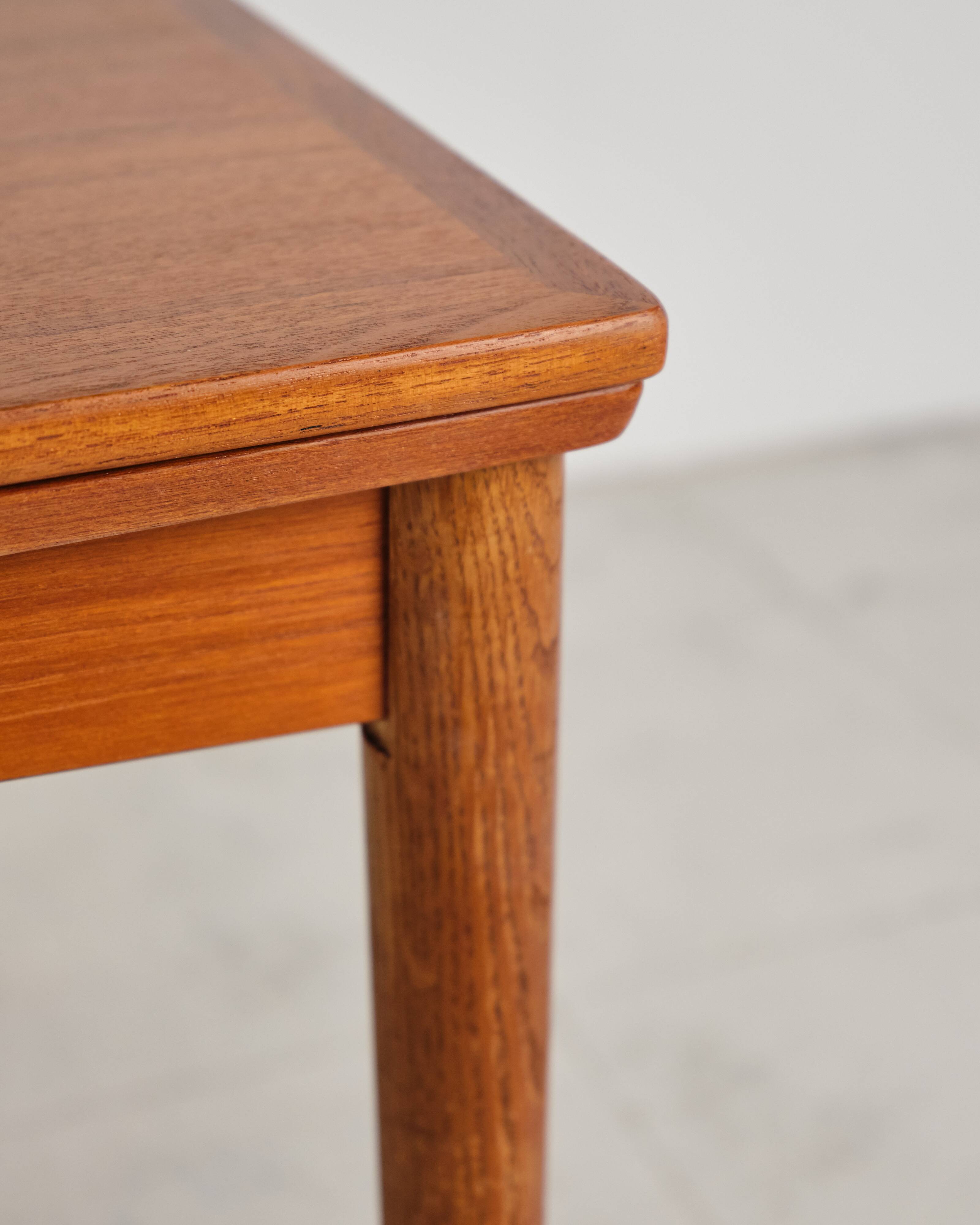Extendable teak table by Poul Hundevad, Denmark