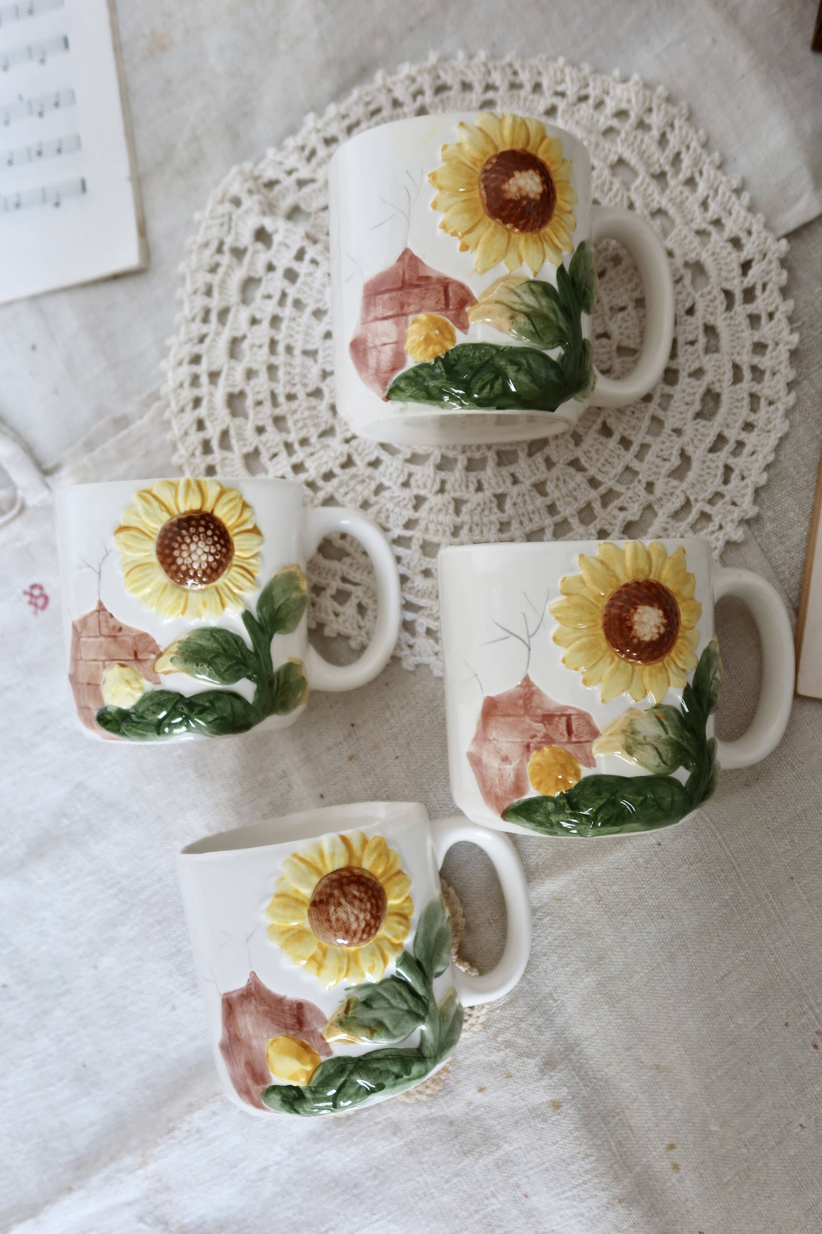 Set of 4 vintage barbotine cups / mugs with polychrome sunflower pattern