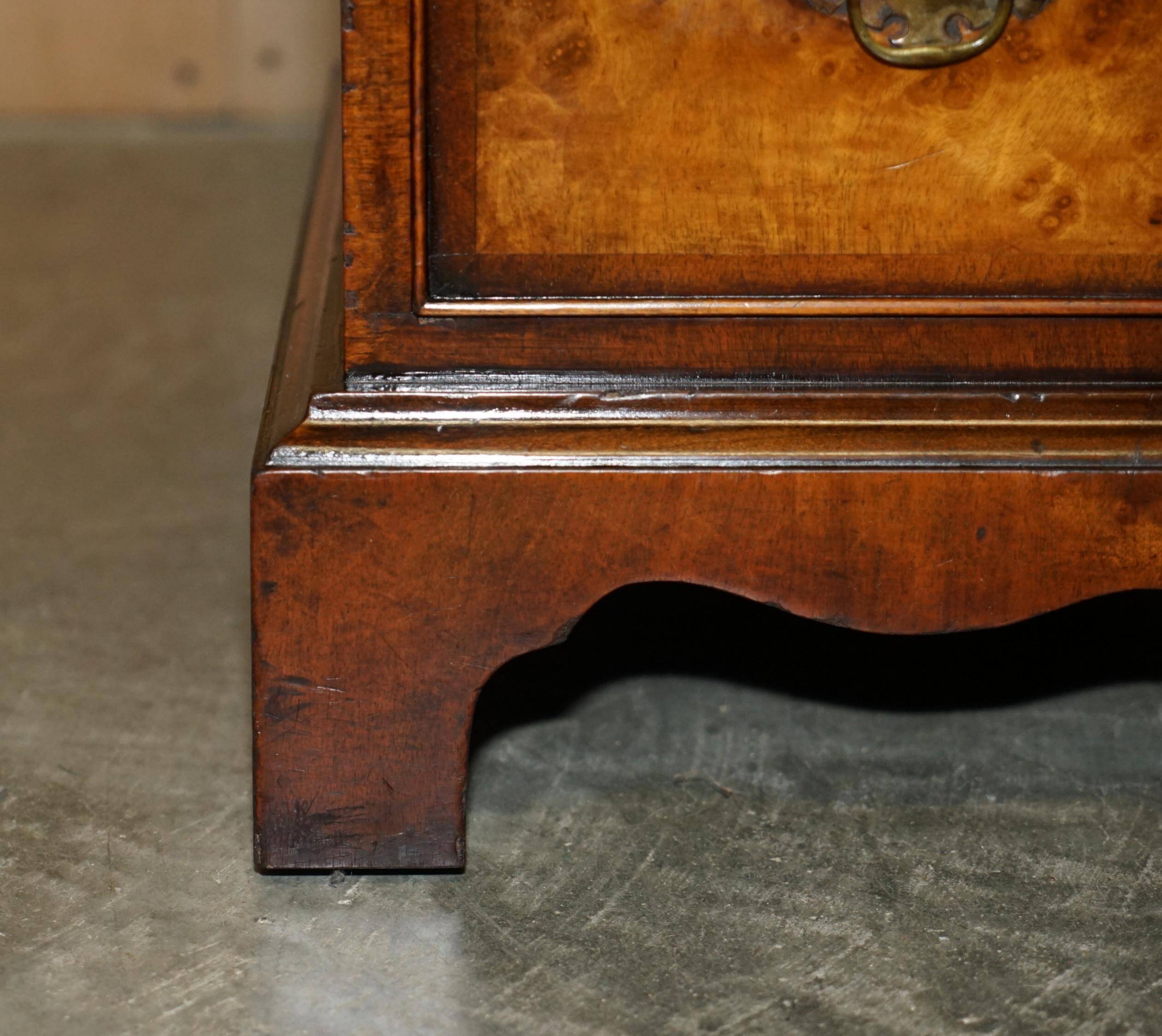 Victorian antique partner's desk in veined walnut with a leather top.