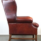 Large comfortable sheepleather wingchair in good condition and beautiful colours