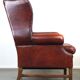 Large comfortable sheepleather wingchair in good condition and beautiful colours