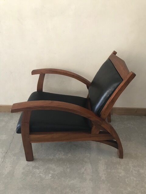 Teak armchair and black leather