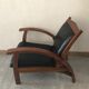 Teak armchair and black leather