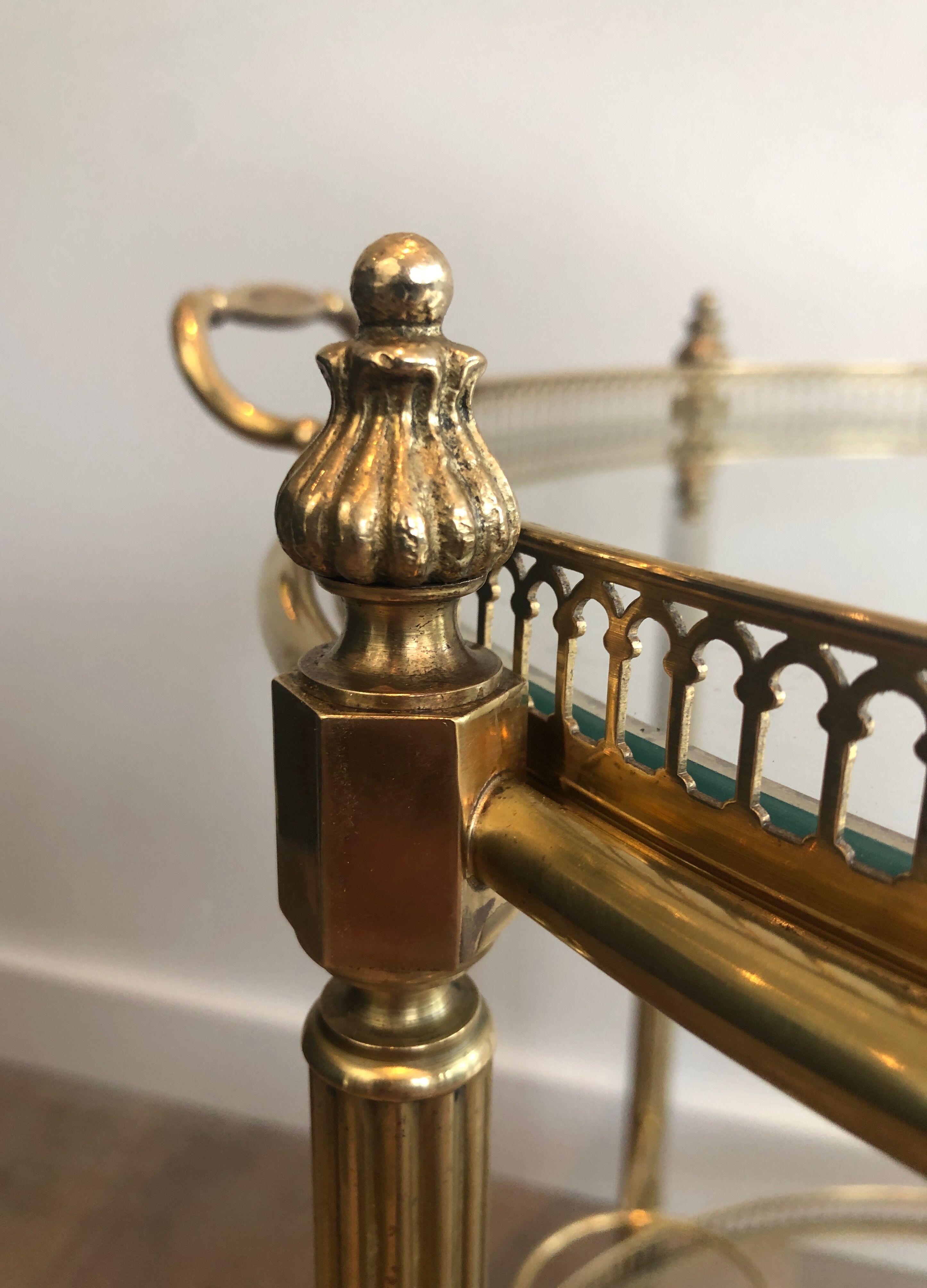 Neoclassical style rolling table in brass