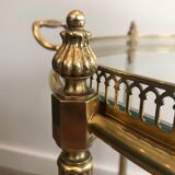 Neoclassical style rolling table in brass