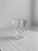 Clear glass vase, twisted design.