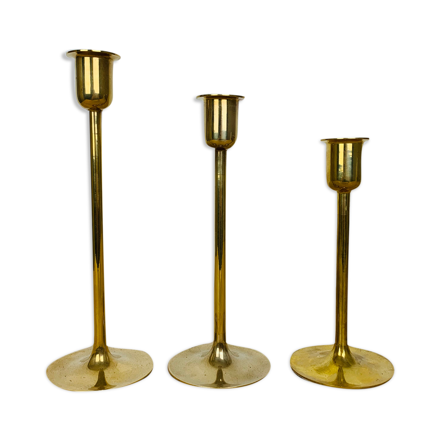 Three Scandinavian brass candle holders