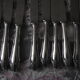 12 silver metal table knives from ROSTFREI