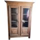 Antique display cabinet in solid oak with two glass doors.