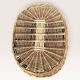 Woven blonde wicker basket