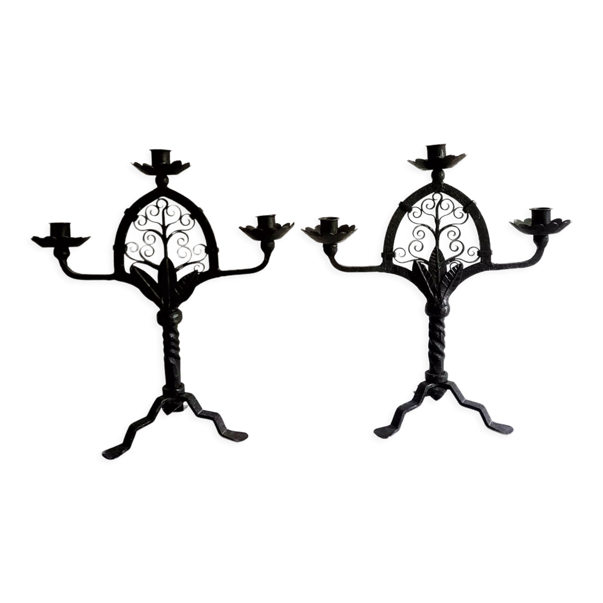 Pair of wrought iron candelabras. Mid-twentieth century.
