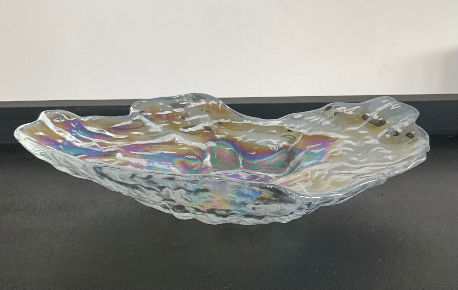 Empty vintage pocket in iridescent glass