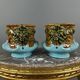 Paire de cache-pots en barbotine à décor de mascarons, XIXe siècle