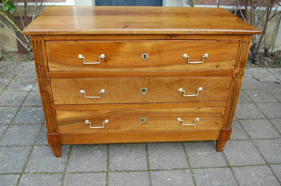 18th-century Louis XVI low walnut commode.