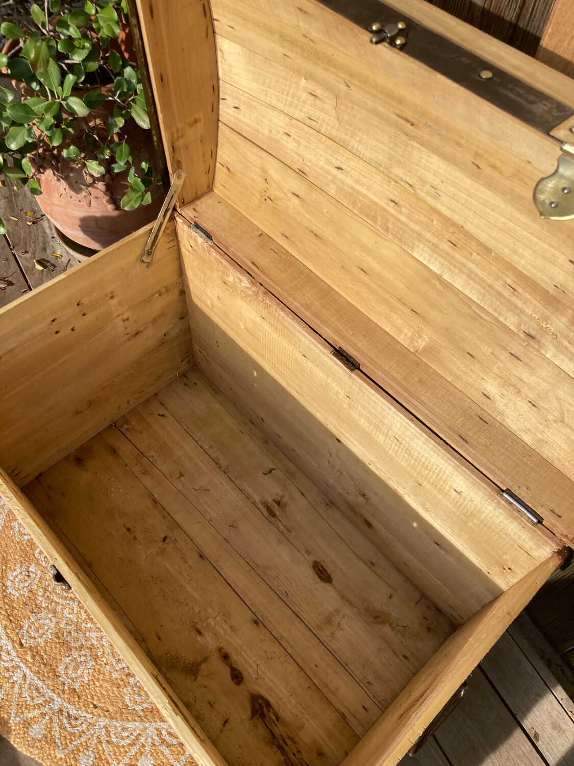 Exceptional curved leather/brass box with beautiful restored clasps.