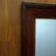 bevelled mirror in carved wood, gold frame. 58x78x3 cm