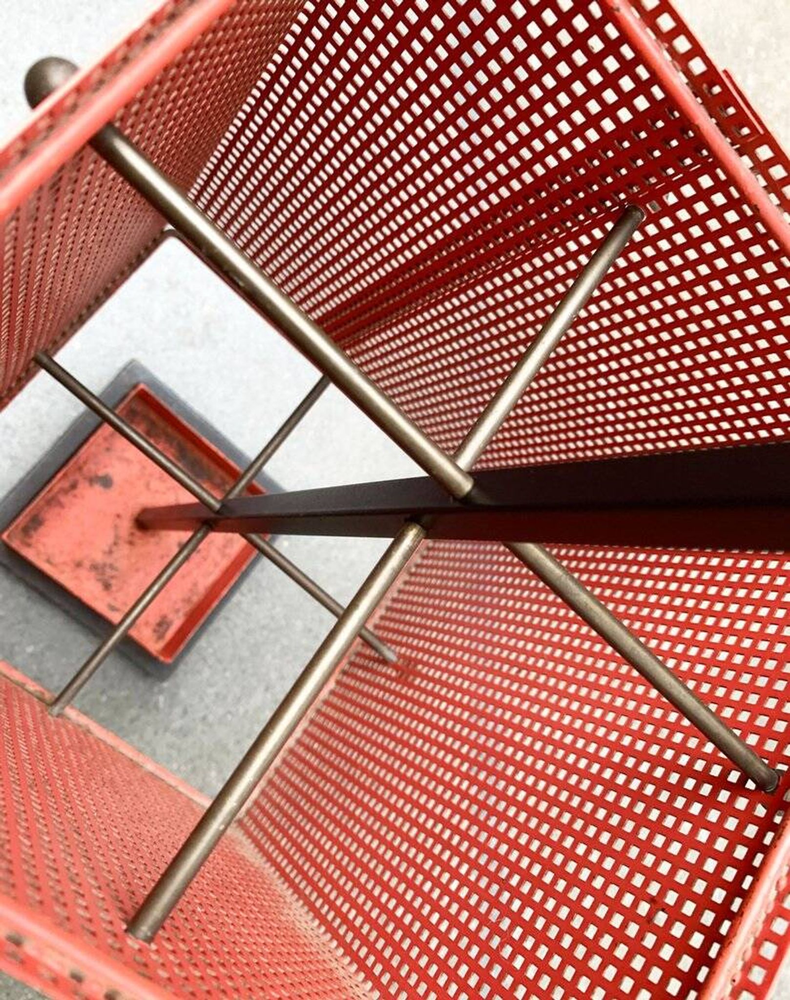 Minimalist perforated steel umbrella stand, 1960s